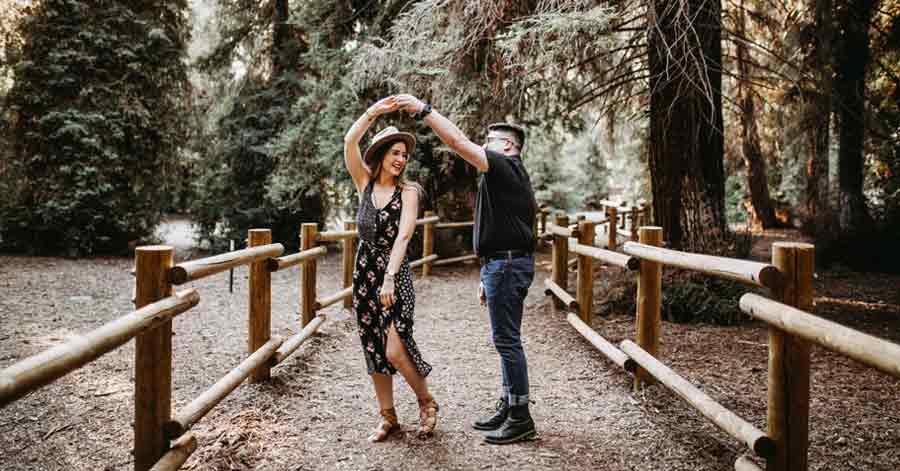 couple dancing in the forest