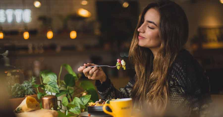 woman enjoying a meal